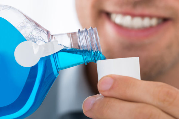 Using mouthwash is one of our recommended dental hygiene tips
