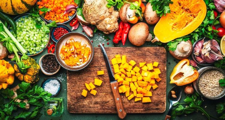 Full table of food being prepared