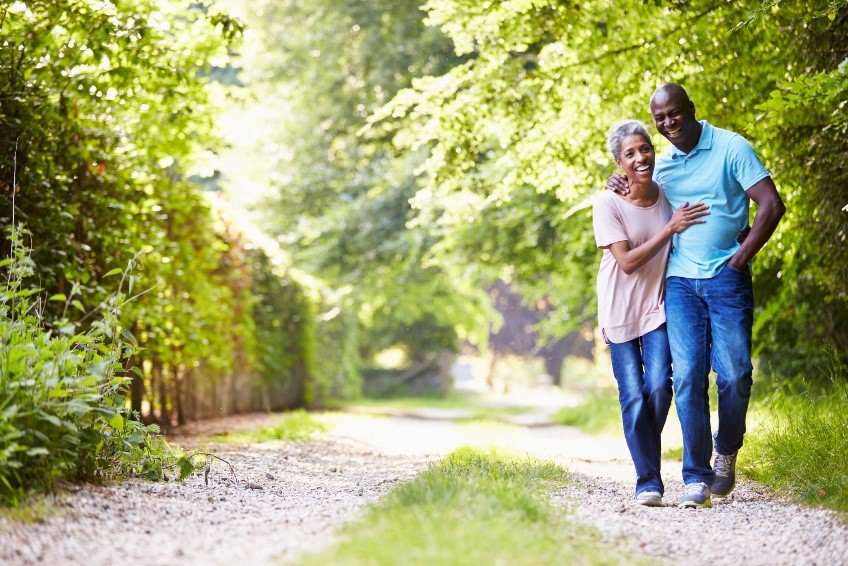 African American couple walking in the woods