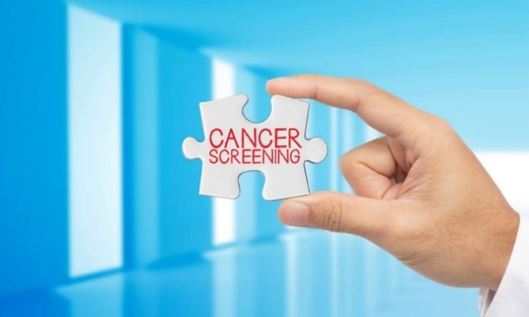 puzzle piece being held that reads cancer screening