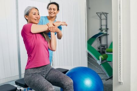 woman sitting on a yoga ball